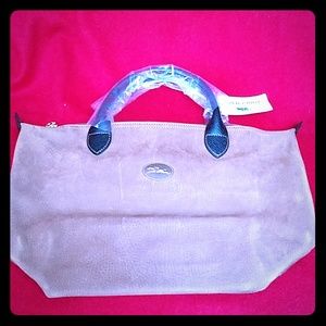 Brand new Longchamp leather handbag.